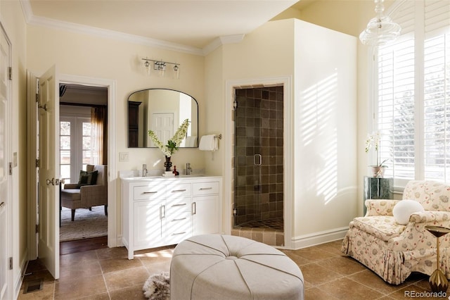 5700 S Steele St, Greenwood Village, CO 80121 - full bath featuring double vanity, a stall shower, and ornamental molding