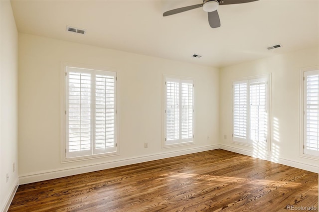 5700 S Steele St, Greenwood Village, CO 80121 - spare room featuring wood finished floors and a ceiling fan