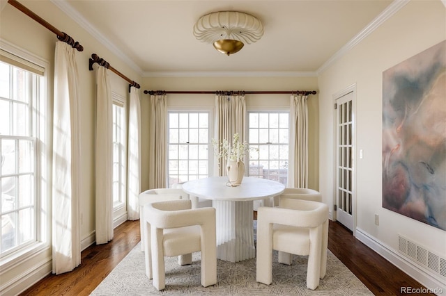 5700 S Steele St, Greenwood Village, CO 80121 - dining area featuring plenty of natural light, ornamental molding, and dark wood finished floors