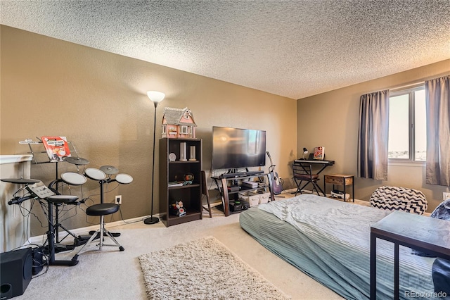 carpeted bedroom featuring a textured wall, a textured ceiling, and baseboards