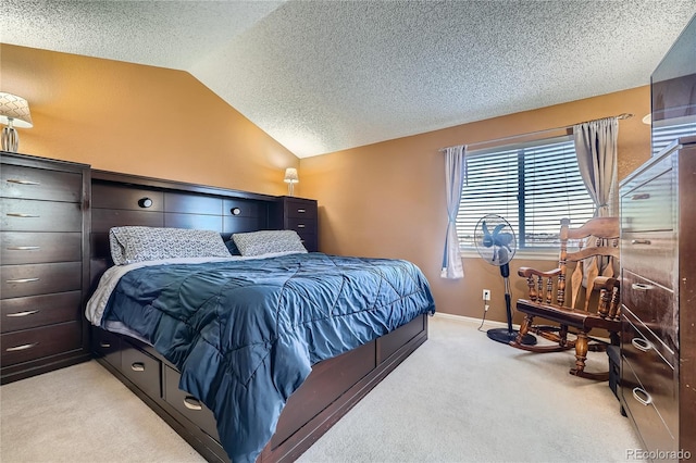 bedroom featuring lofted ceiling, light carpet, baseboards, and a textured ceiling