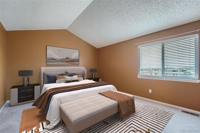 5130 S Wenatchee St, Aurora, CO 80015 - carpeted bedroom featuring vaulted ceiling, a textured ceiling, and baseboards