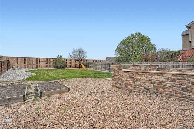 5130 S Wenatchee St, Aurora, CO 80015 - view of yard featuring a garden and a playground