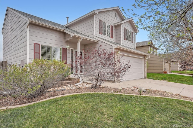 5130 S Wenatchee St, Aurora, CO 80015 - view of front facade featuring a front lawn, a garage, and driveway
