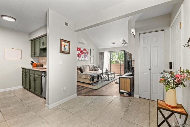 3600 S Pierce St Unit 7-208, Denver, CO 80235 - entryway featuring baseboards and light tile patterned floors