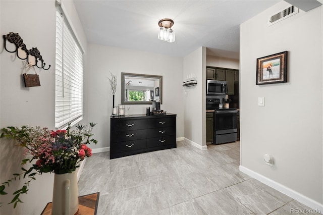 3600 S Pierce St Unit 7-208, Denver, CO 80235 - hall featuring baseboards