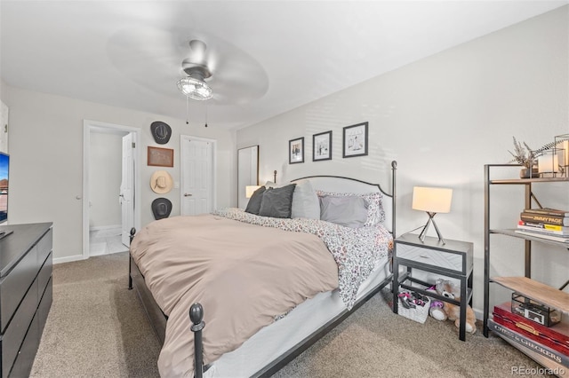3600 S Pierce St Unit 7-208, Denver, CO 80235 - carpeted bedroom with ceiling fan and ensuite bathroom