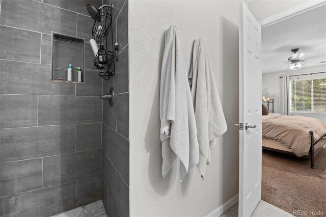 3600 S Pierce St Unit 7-208, Denver, CO 80235 - ensuite bathroom with a tile shower