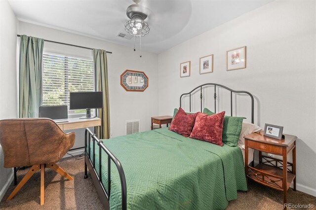 3600 S Pierce St Unit 7-208, Denver, CO 80235 - bedroom featuring carpet floors, a desk, and ceiling fan