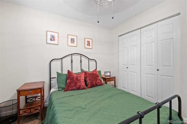 3600 S Pierce St Unit 7-208, Denver, CO 80235 - carpeted bedroom featuring a closet and a ceiling fan
