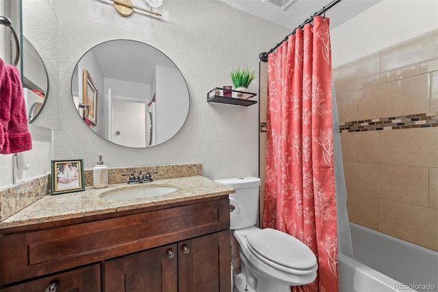 3600 S Pierce St Unit 7-208, Denver, CO 80235 - full bathroom with a textured wall, shower / bath combo with shower curtain, and vanity
