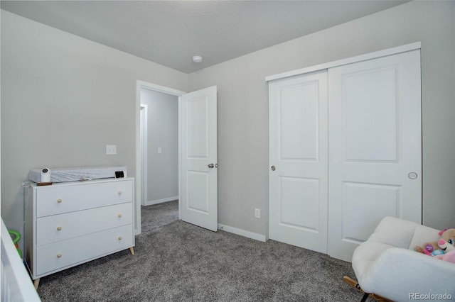 carpeted bedroom with a closet