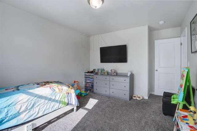 bedroom featuring carpet flooring