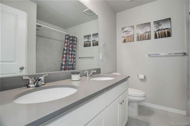 bathroom featuring a shower with shower curtain, vanity, toilet, and tile patterned flooring