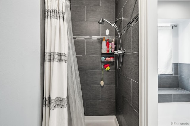 1080 S Yampa St, Aurora, CO 80017 - full bathroom featuring a tile shower