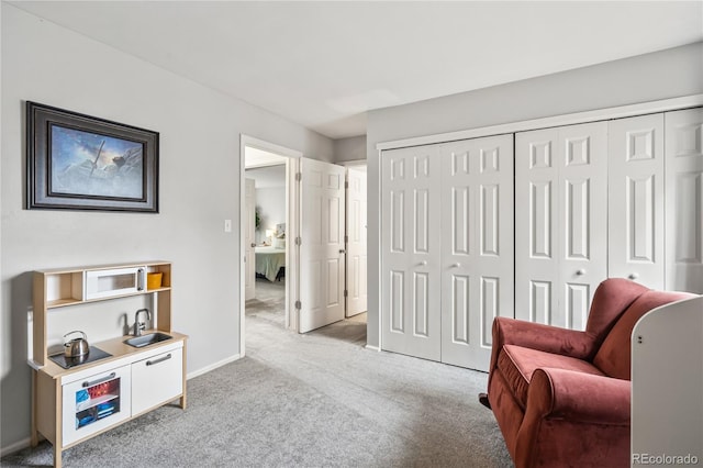 1080 S Yampa St, Aurora, CO 80017 - sitting room featuring light colored carpet and baseboards