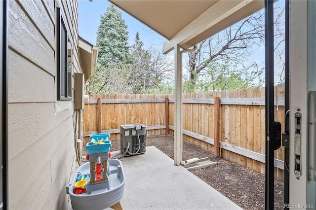 1080 S Yampa St, Aurora, CO 80017 - fenced backyard featuring a patio and central AC unit