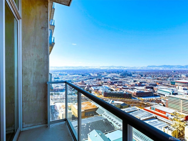 balcony featuring a mountain view