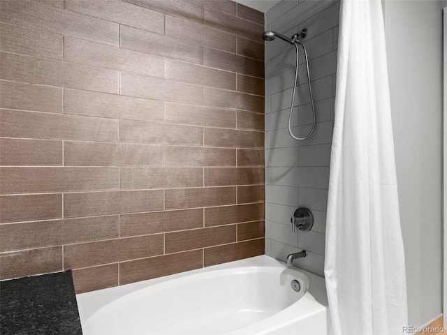 bathroom featuring shower / bathtub combination with curtain