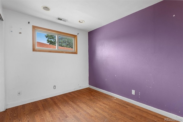 6150 E 65th Ave, Commerce City, CO 80022 - empty room featuring wood finished floors and baseboards