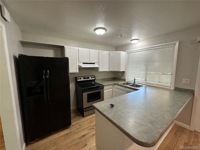 kitchen with black refrigerator with ice dispenser, white cabinetry, light hardwood / wood-style flooring, stainless steel electric range, and sink