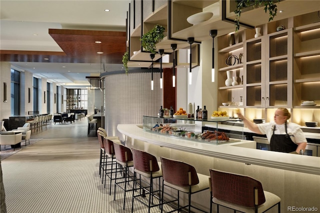 1133 14th St Unit 4150, Denver, CO 80202 - community bar area featuring wood finished floors and recessed lighting