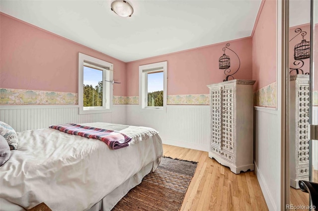 bedroom with light wood-type flooring