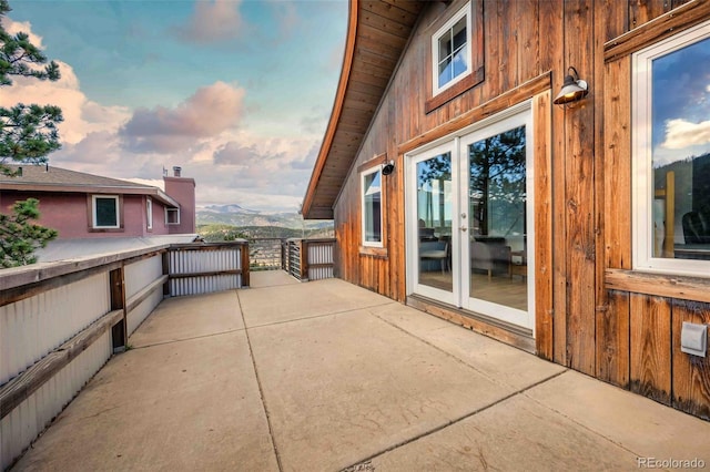 view of patio / terrace featuring a mountain view