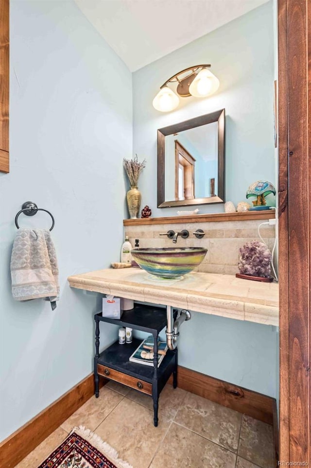 bathroom featuring tile patterned floors and sink