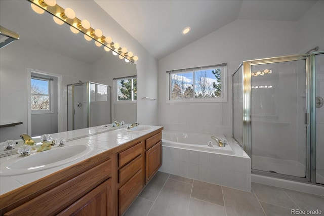 full bath with plenty of natural light, a shower stall, and a sink