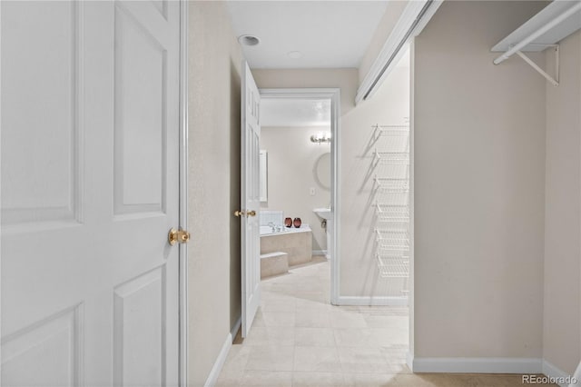2951 S Walden Ct, Aurora, CO 80013 - hall with baseboards