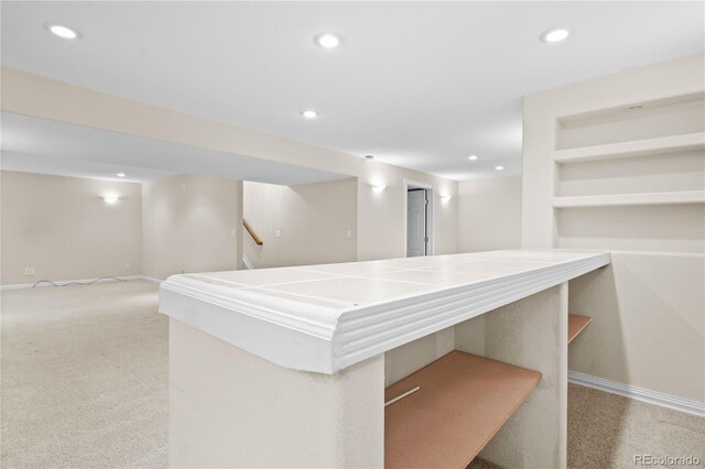 2951 S Walden Ct, Aurora, CO 80013 - finished basement with carpet, recessed lighting, baseboards, and stairs