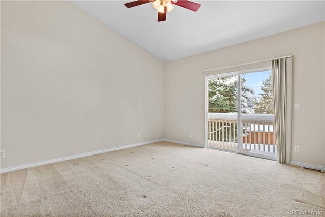 2951 S Walden Ct, Aurora, CO 80013 - spare room with ceiling fan, carpet floors, lofted ceiling, and baseboards