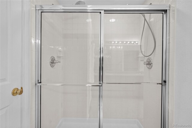 2951 S Walden Ct, Aurora, CO 80013 - full bathroom featuring a shower stall