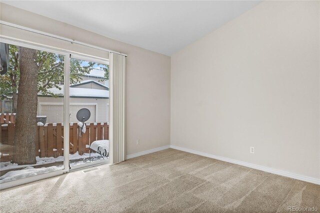 2951 S Walden Ct, Aurora, CO 80013 - spare room featuring carpet floors and baseboards