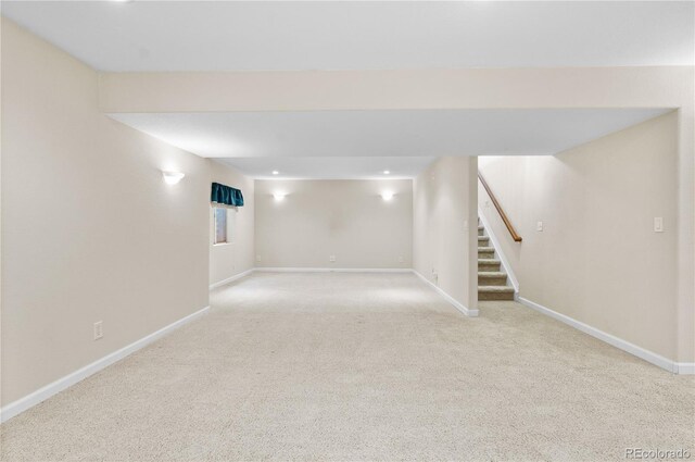 2951 S Walden Ct, Aurora, CO 80013 - finished below grade area featuring carpet, baseboards, stairs, and recessed lighting