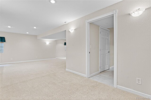 2951 S Walden Ct, Aurora, CO 80013 - below grade area with carpet floors, baseboards, and recessed lighting