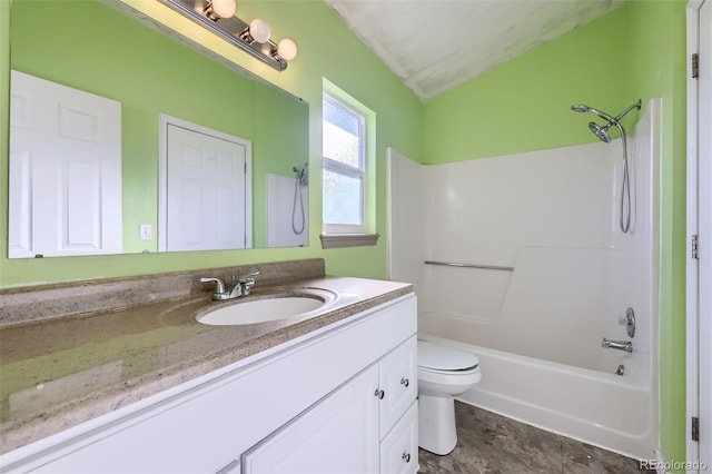 full bathroom with bathing tub / shower combination, toilet, and vanity