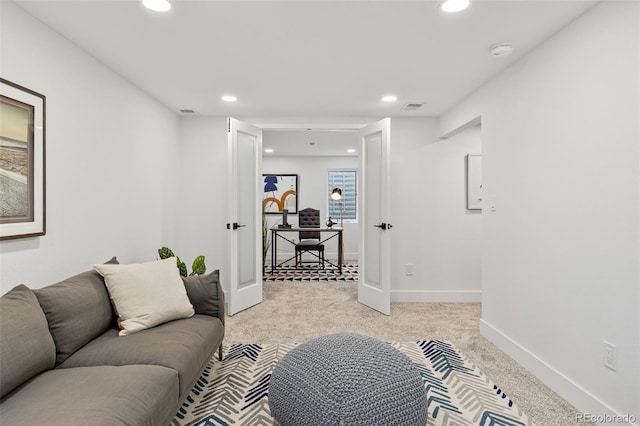 5573 S Huron St, Littleton, CO 80120 - living area featuring recessed lighting, light carpet, and french doors