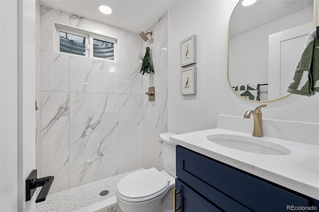 5573 S Huron St, Littleton, CO 80120 - full bathroom featuring vanity and a marble finish shower