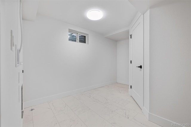 5573 S Huron St, Littleton, CO 80120 - finished basement featuring light marble finish floors