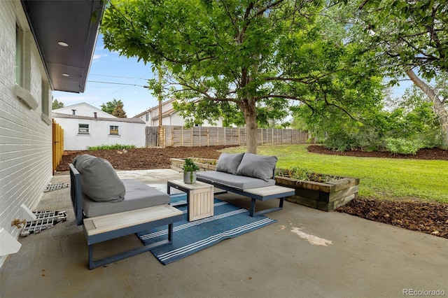 5573 S Huron St, Littleton, CO 80120 - fenced backyard featuring a patio and an outdoor living space