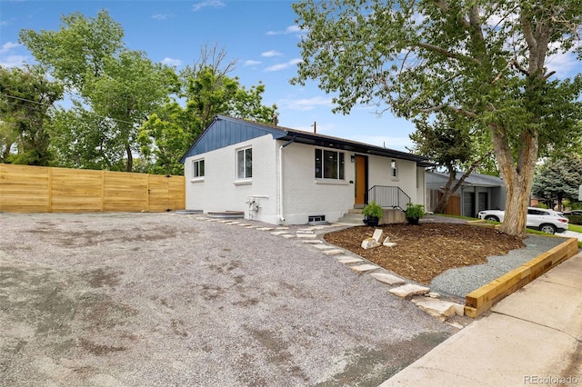 5573 S Huron St, Littleton, CO 80120 - view of front facade featuring brick siding