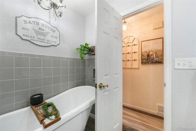 8280 Everett Way, Arvada, CO 80005 - full bathroom featuring a freestanding bath