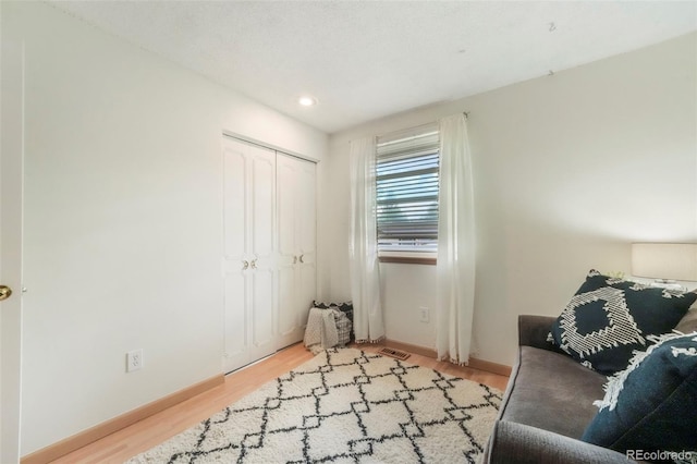 8280 Everett Way, Arvada, CO 80005 - sitting room with wood finished floors and recessed lighting