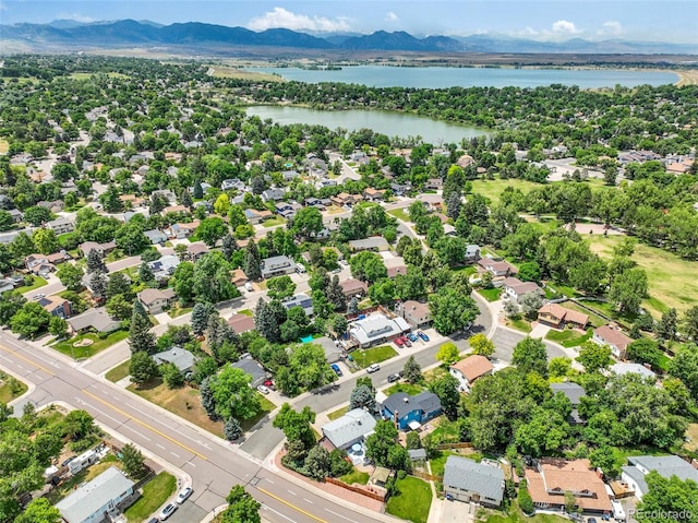 8280 Everett Way, Arvada, CO 80005 - aerial perspective of suburban area with a water and mountain view