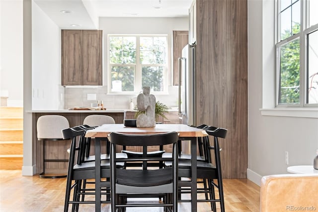 dining room with light hardwood / wood-style floors