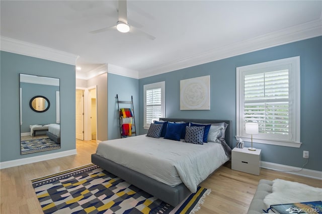 8721 E 23rd Ave, Denver, CO 80238 - bedroom featuring light wood finished floors, ornamental molding, baseboards, and ceiling fan