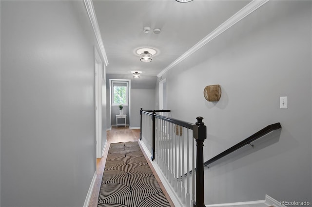 8721 E 23rd Ave, Denver, CO 80238 - hall with an upstairs landing, ornamental molding, baseboards, and wood finished floors