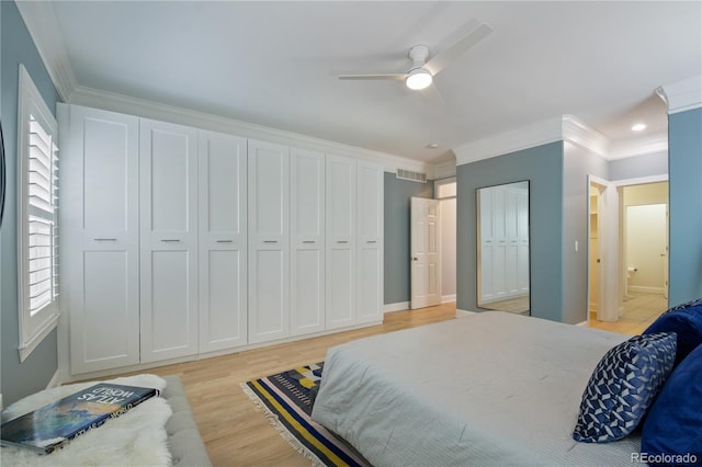 8721 E 23rd Ave, Denver, CO 80238 - bedroom featuring light wood-style floors, crown molding, ensuite bathroom, recessed lighting, and baseboards